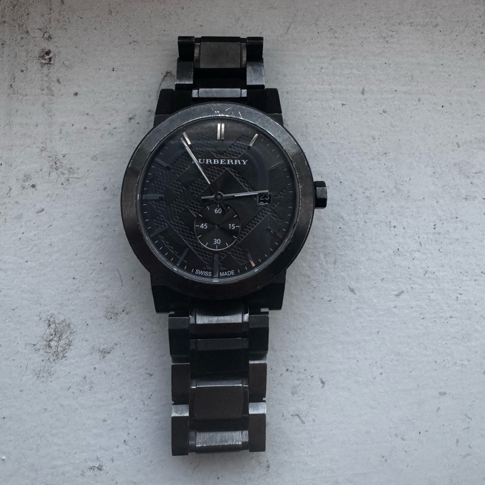 Burberry Watch 
Black 
Saphire Crystal Material
Link Bracelet/Band